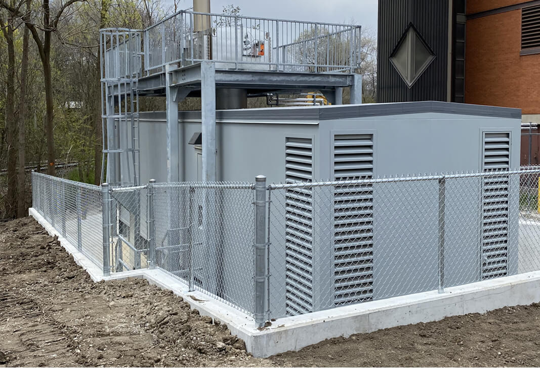Industrial generator surrounded with fences