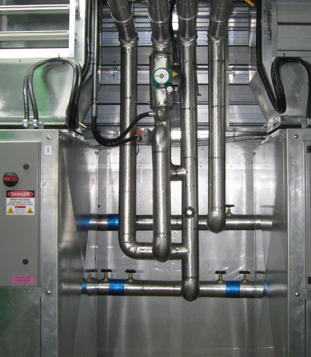 Industrial mechanical room  with piping, ventilation and electrical system